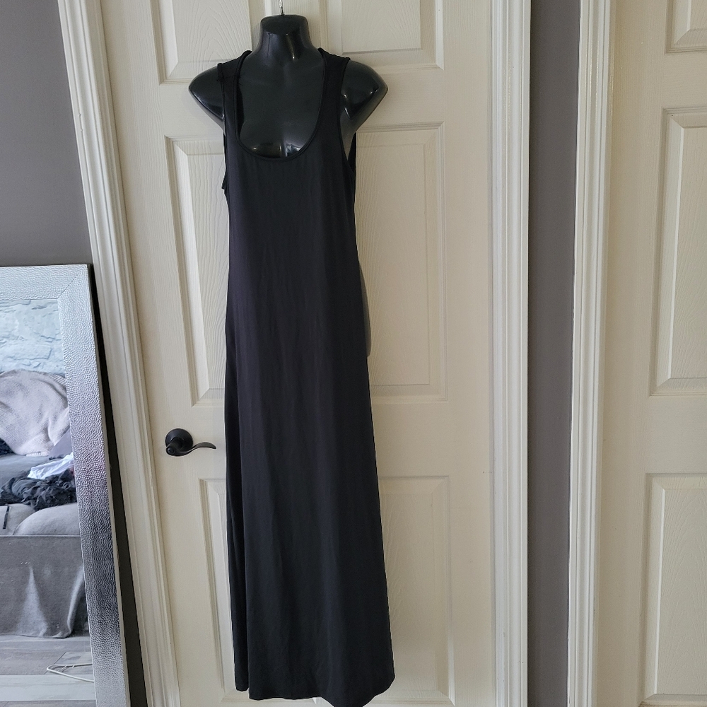 Stretchy black dress with back cut outs. Size XL